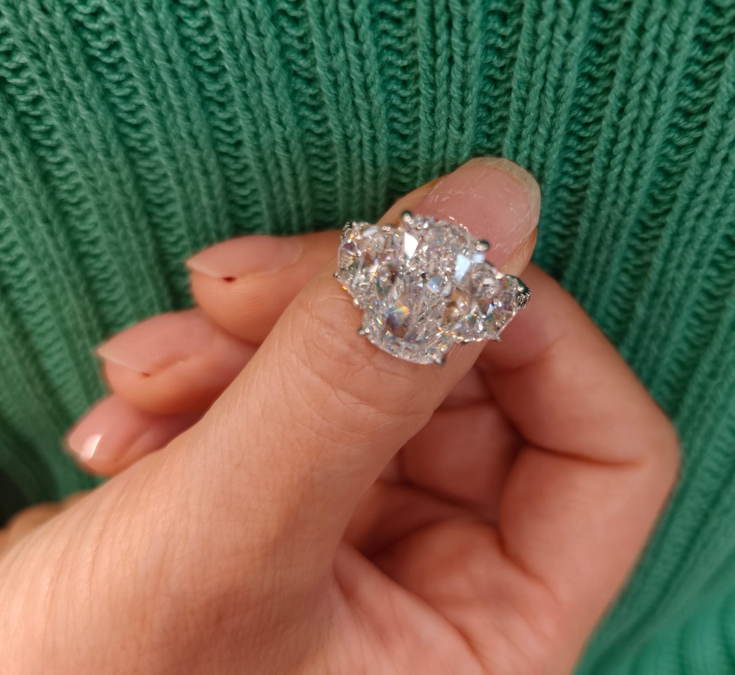 Customer photo review of 6.0 Ct Elongated Cushion Cut Simulated Diamond Three-Stone Travel Engagement Ring in S925 Sterling Silver