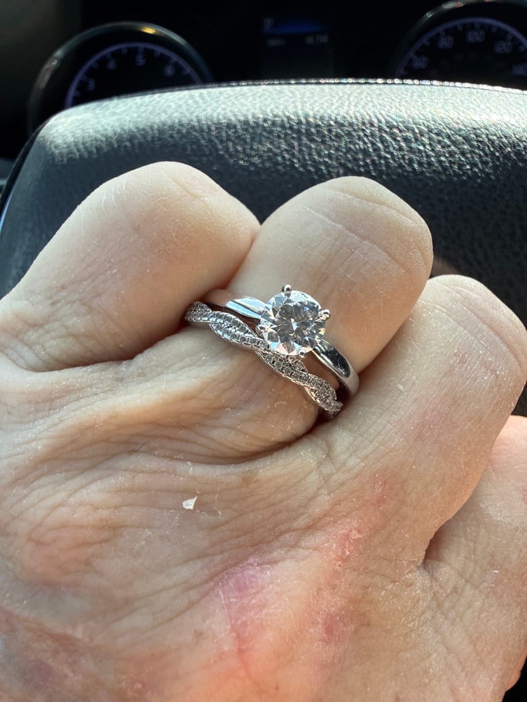 Customer photo review of Classic Solitaire Round Moissanite Four Prong Engagement Ring