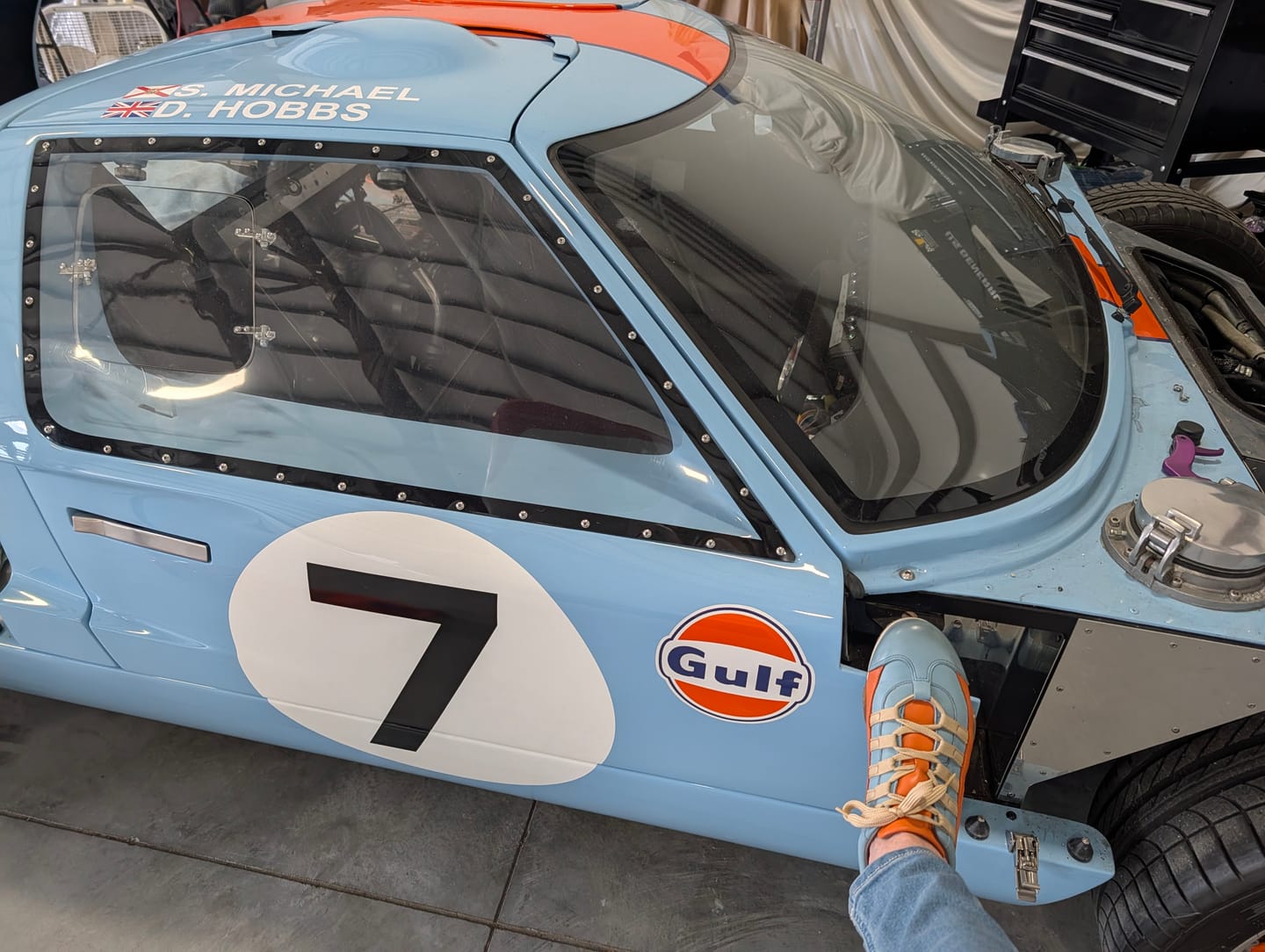 Customer photo review of Women's Racing Sneaker in Blue and Orange