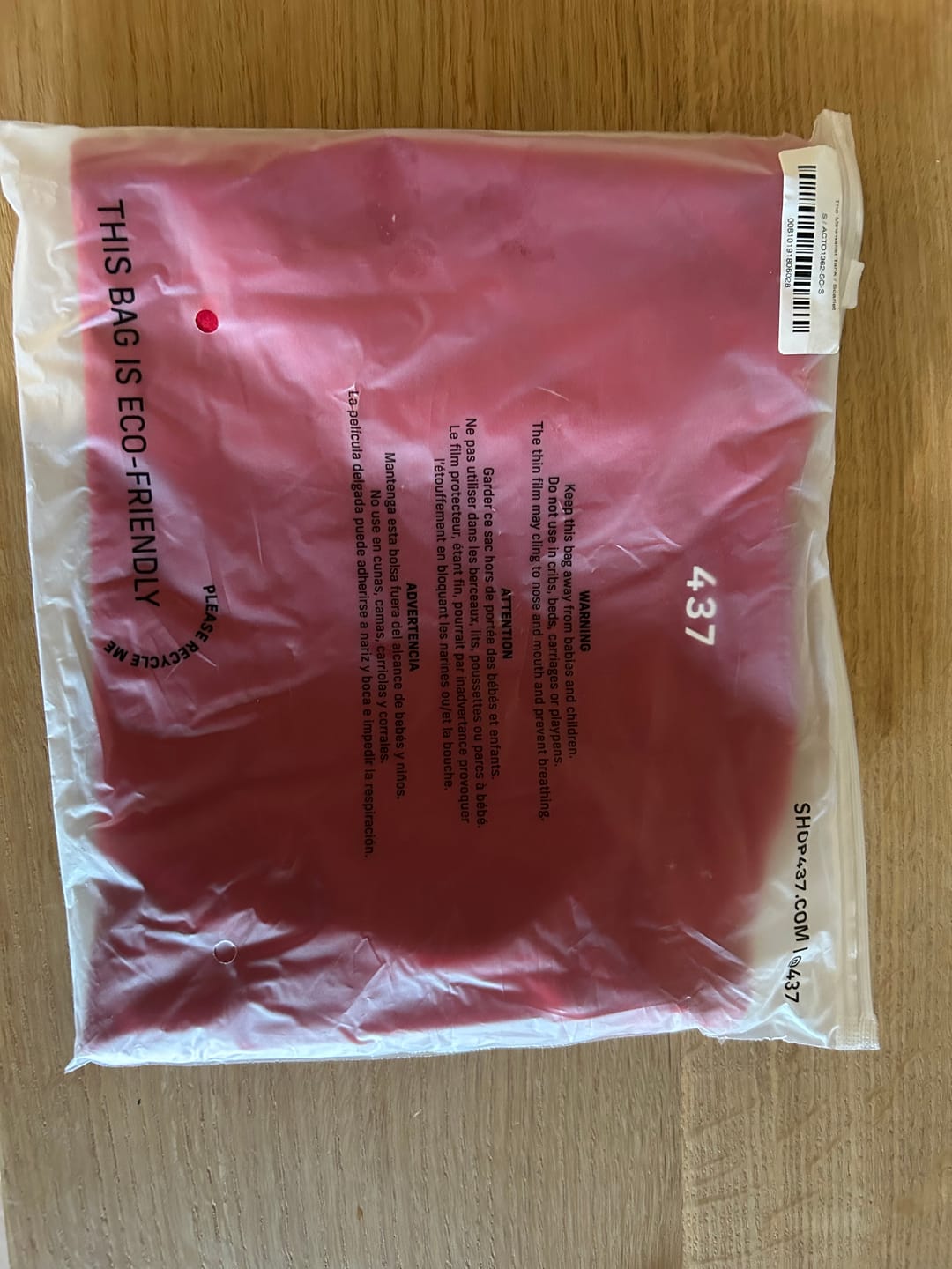 Customer photo review of The Minimalist Tank Scarlet
