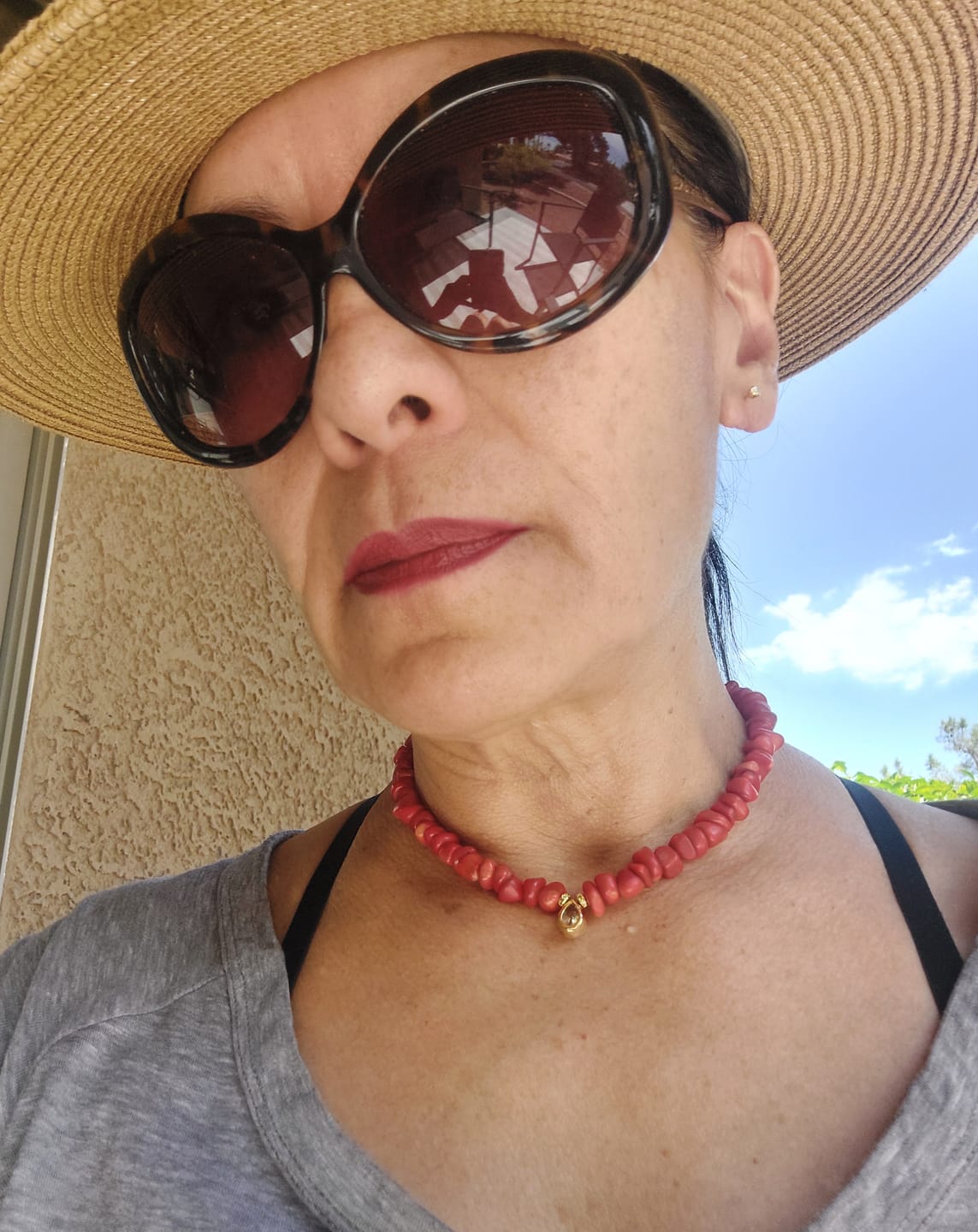 Customer photo review of Teardrop Grace Necklace – Red Organic Beads with Zircon Drop