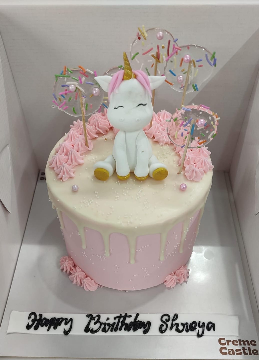Customer photo review of Unicorn Drip Cream Cake