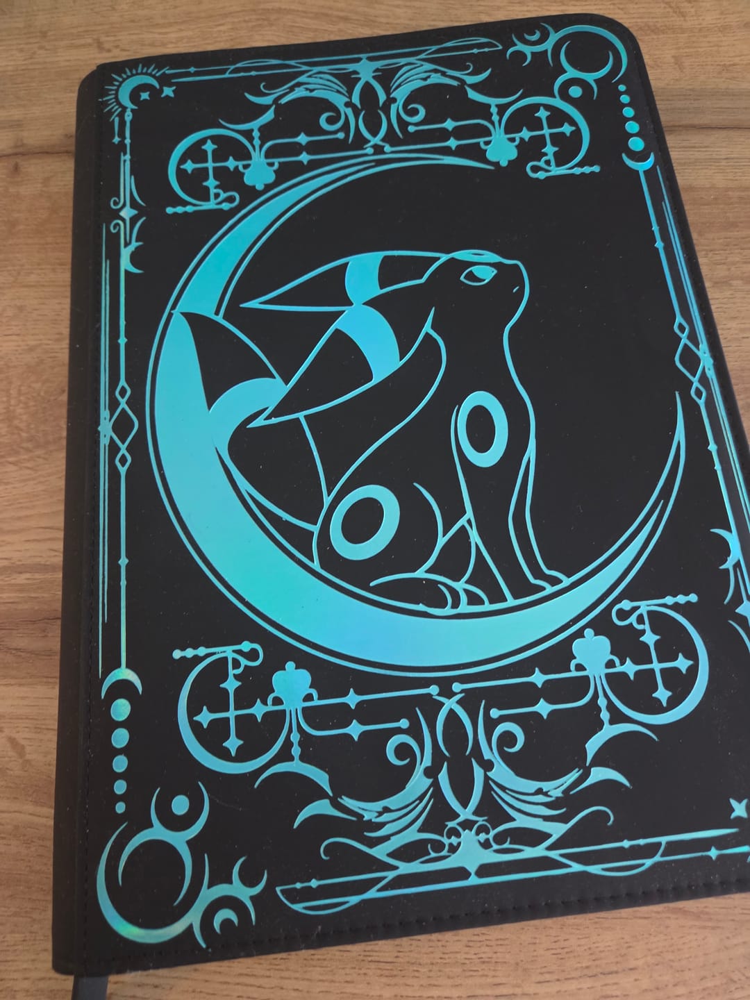 Customer photo review of Lunar Shadow Shiny 9-Pocket Trading Card Binder