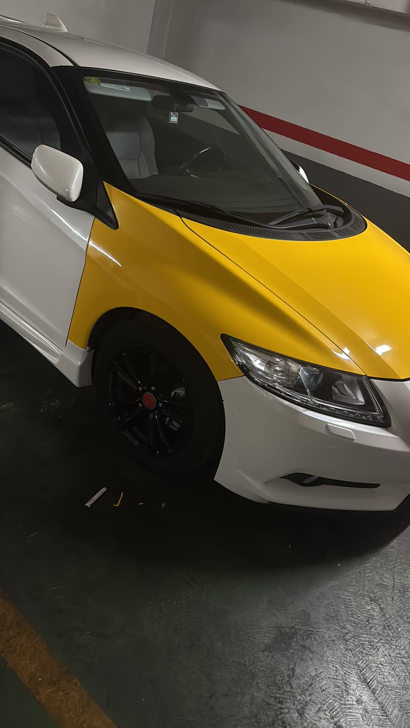 Customer photo review of High Gloss Sunflower Yellow Vinyl Wrap