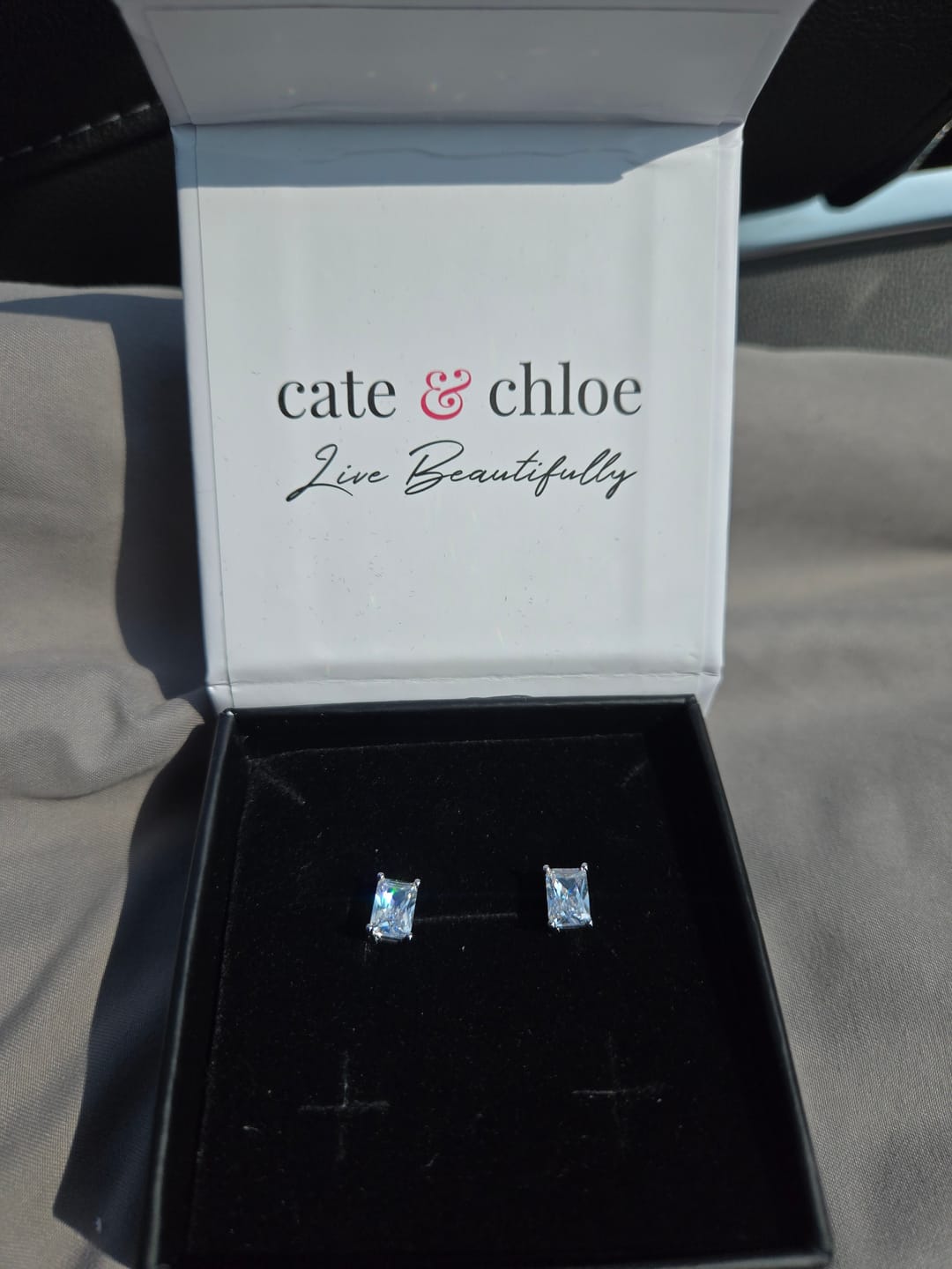 Customer photo review of Mia 18k White Gold Plated Sterling Silver Stud Earrings with Simulated Diamond Crystals
