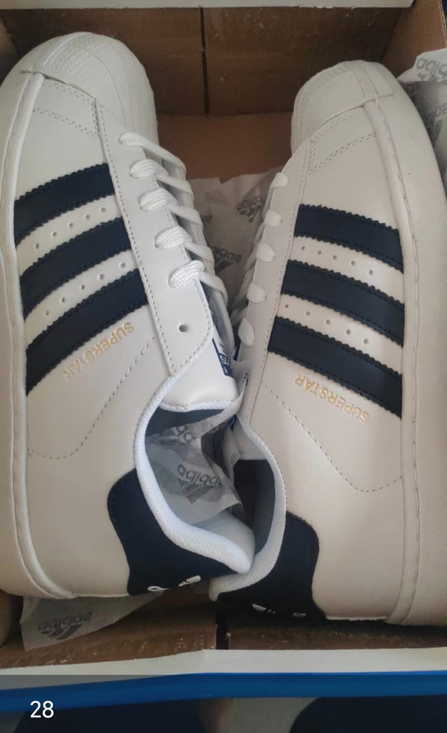 Customer photo review of Tenis Concha Blanco Marino