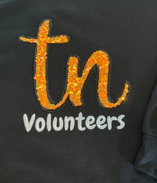 Customer photo review of Orange Sequin on Velvet