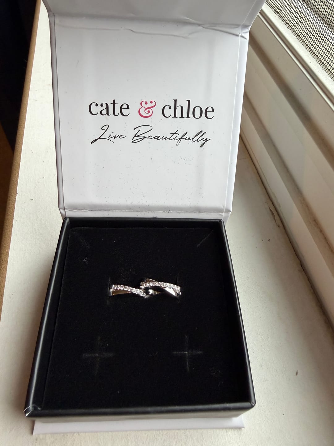 Customer photo review of Amaya 18k White Gold Plated 16mm Twisted Hoop Earrings with Swarovski Crystals