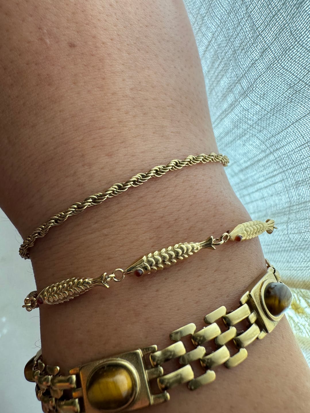 Customer photo review of Crimson Gaze Fish Bracelet