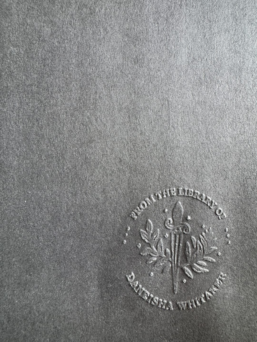 Customer photo review of My Book Embosser – Custom Book Embosser