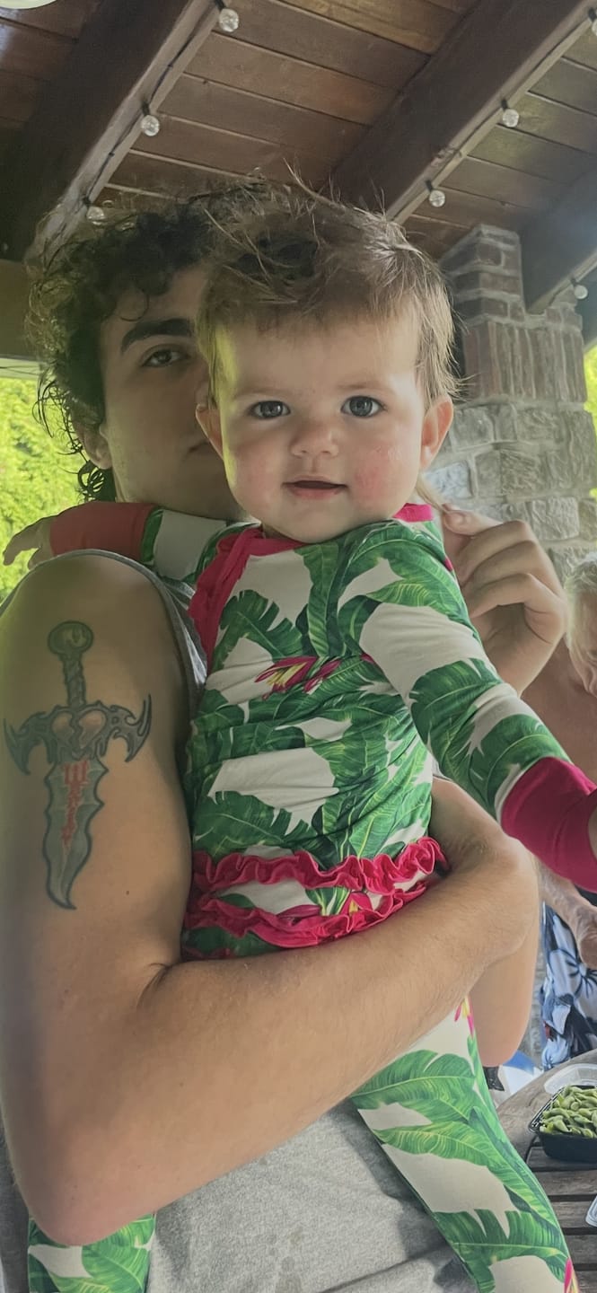 Customer photo review of Ruffled Bamboo Zippy Sleeper in Palm Paradise