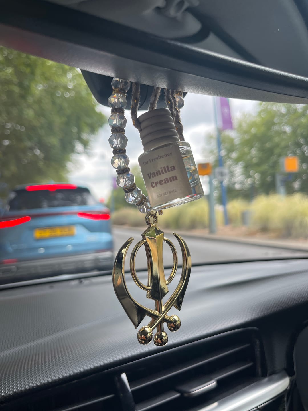 Customer photo review of Car Hanging - Gold Khanda - Gemstone