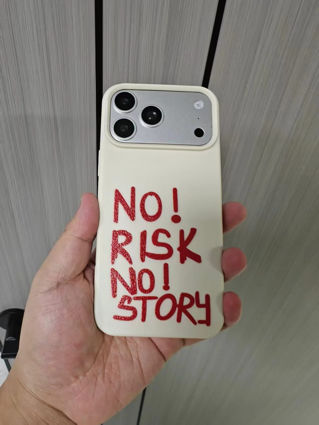Customer photo review of 'NO RISK, NO STORY' iPhone Case