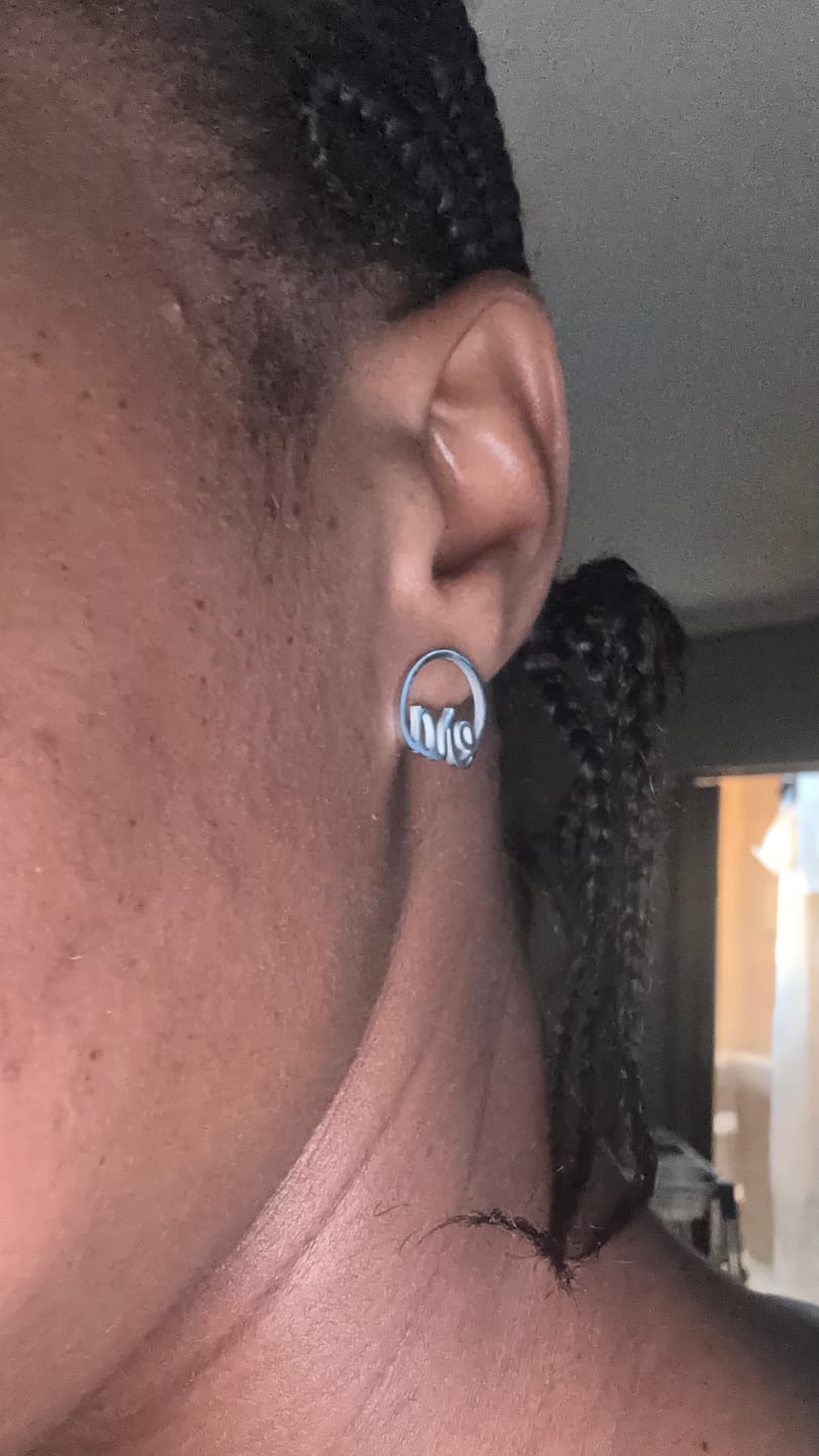 Customer photo review of Silver Era Logo Studs