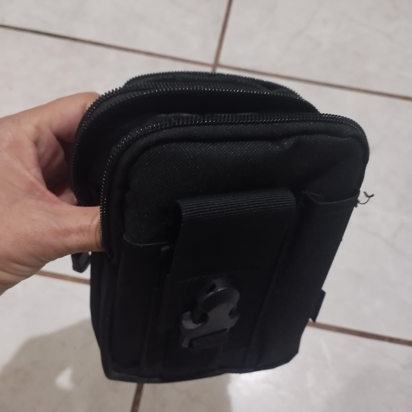 Customer photo review of Bolsa Tactica P/Cinturon Bolta-N Negro Truper