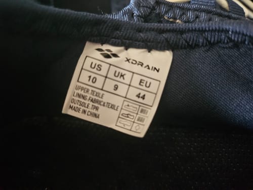 Customer's Xdrain Crew shoe interior showing a size 10 label inside the dark navy fabric shoe.