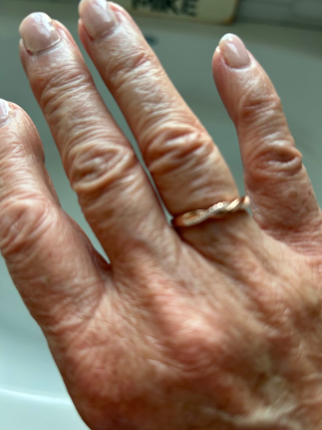 Customer photo review of Twisted Vine Moissanite Half Eternity Wedding Band Stackable Ring