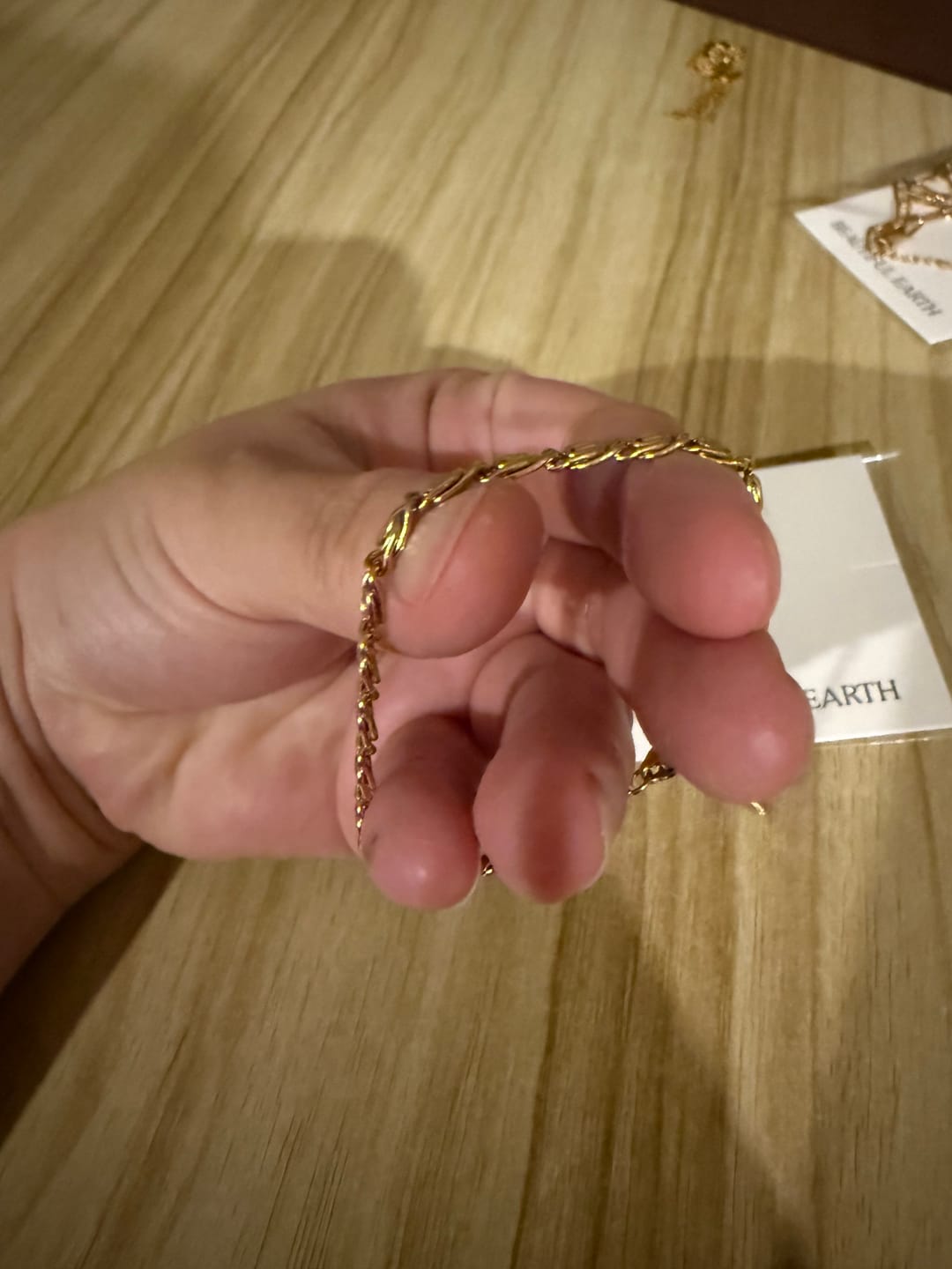 Customer photo review of Gold Swirl Link Chain Bracelet