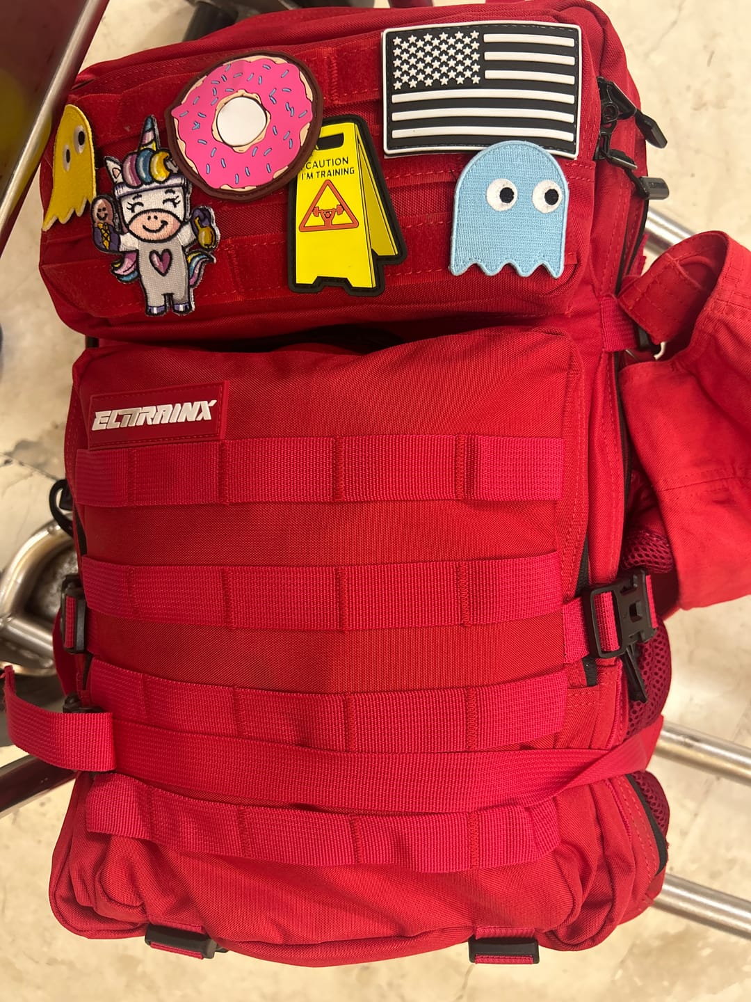 Customer photo review of Mochila Táctica V1 45L All In Rojo
