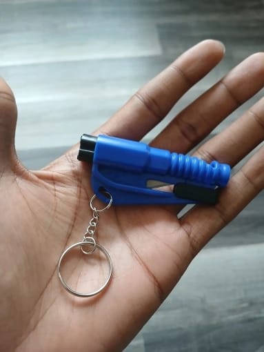 Customer photo review of 3-in-1 Emergency Escape Tool Keychain (Window Breaker & Seatbelt Cutter)