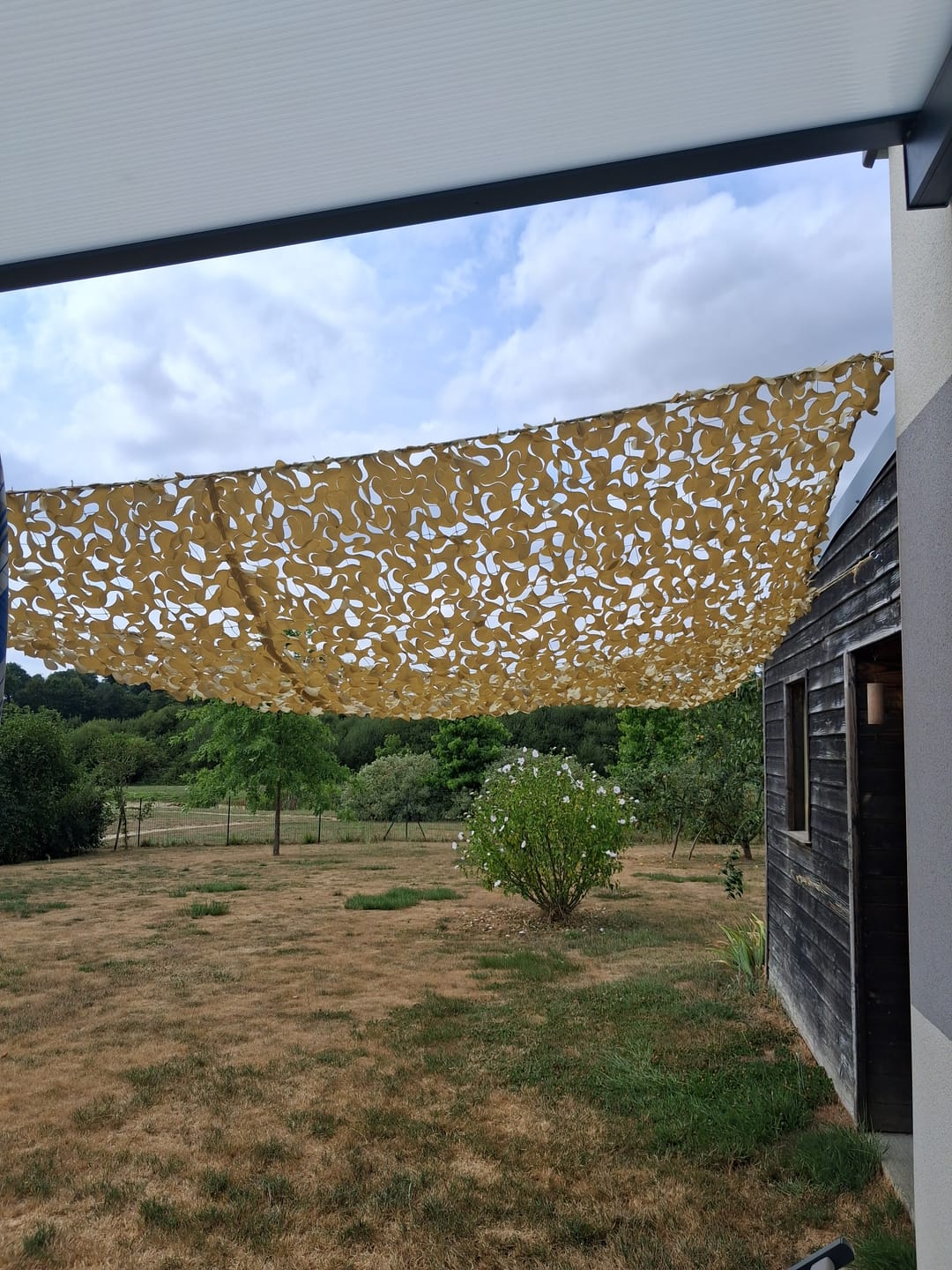 Customer photo review of Filet de camouflage triangulaire sable