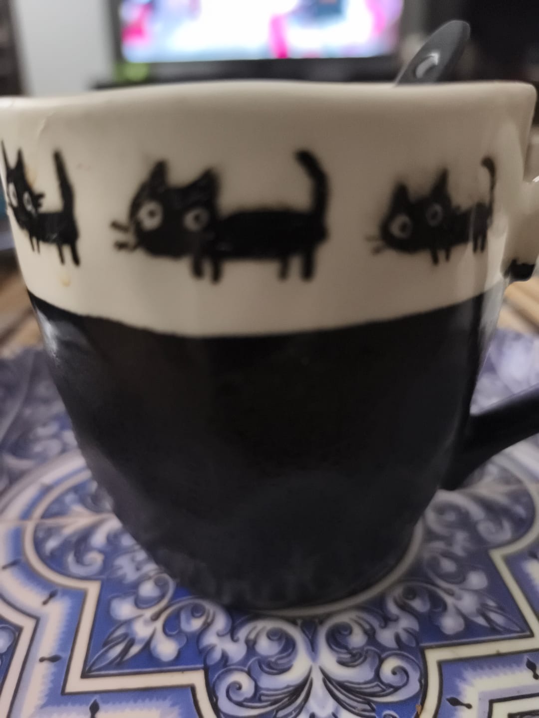 Customer photo review of Taza Japonesa Gato Negro