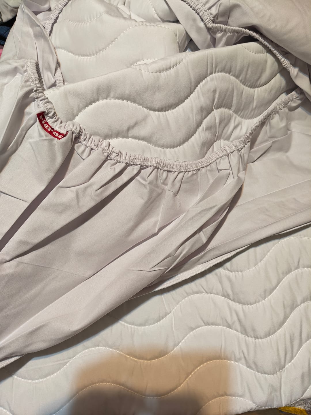 Customer photo review of Fiber Mattress Protector- All around Rubber Band