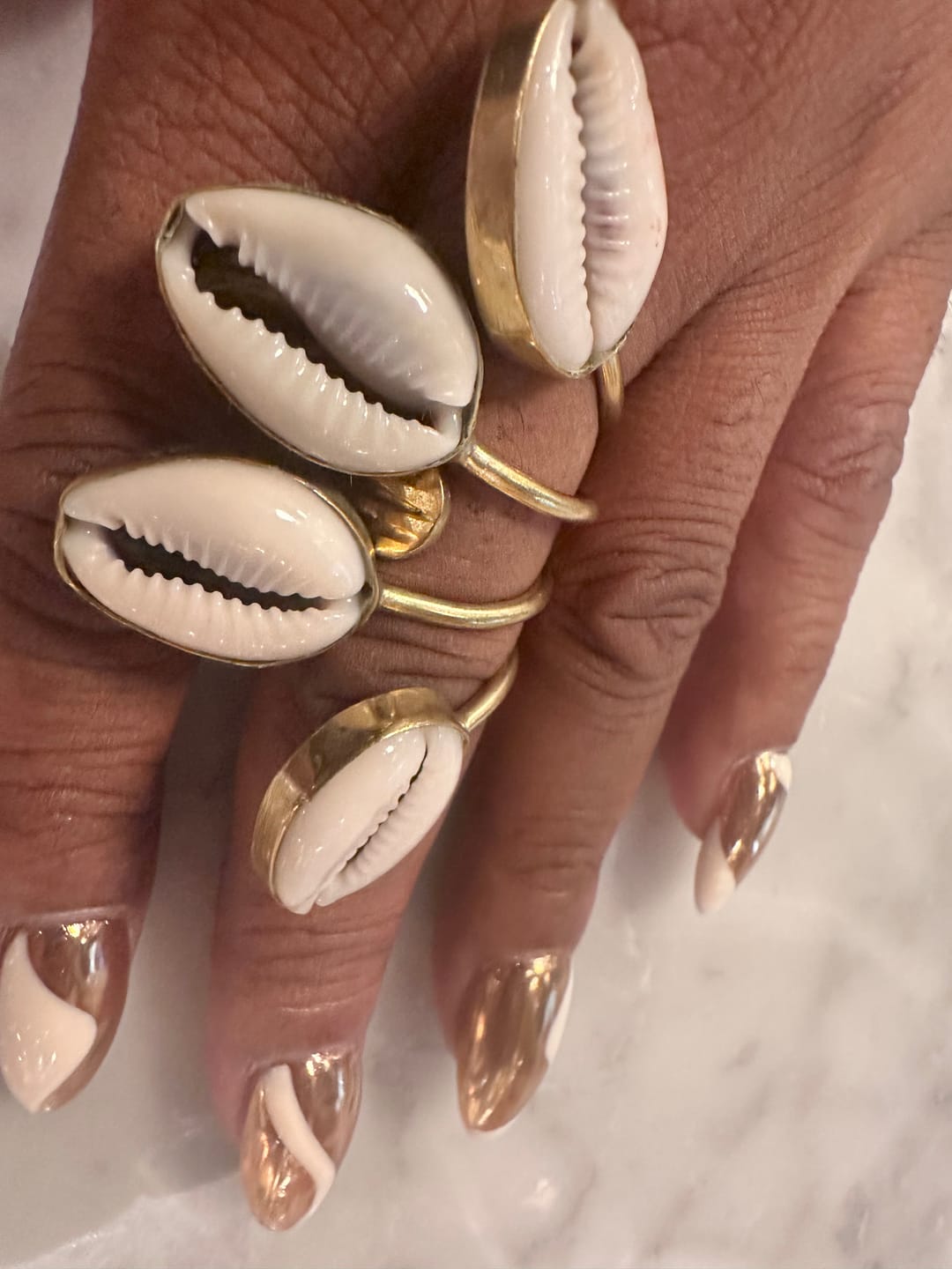 Customer photo review of Kipepeo Cowry Shell Ring