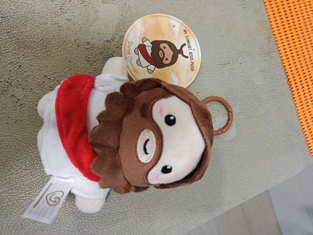 Customer photo review of Mini Jesus Plush Bag Charm