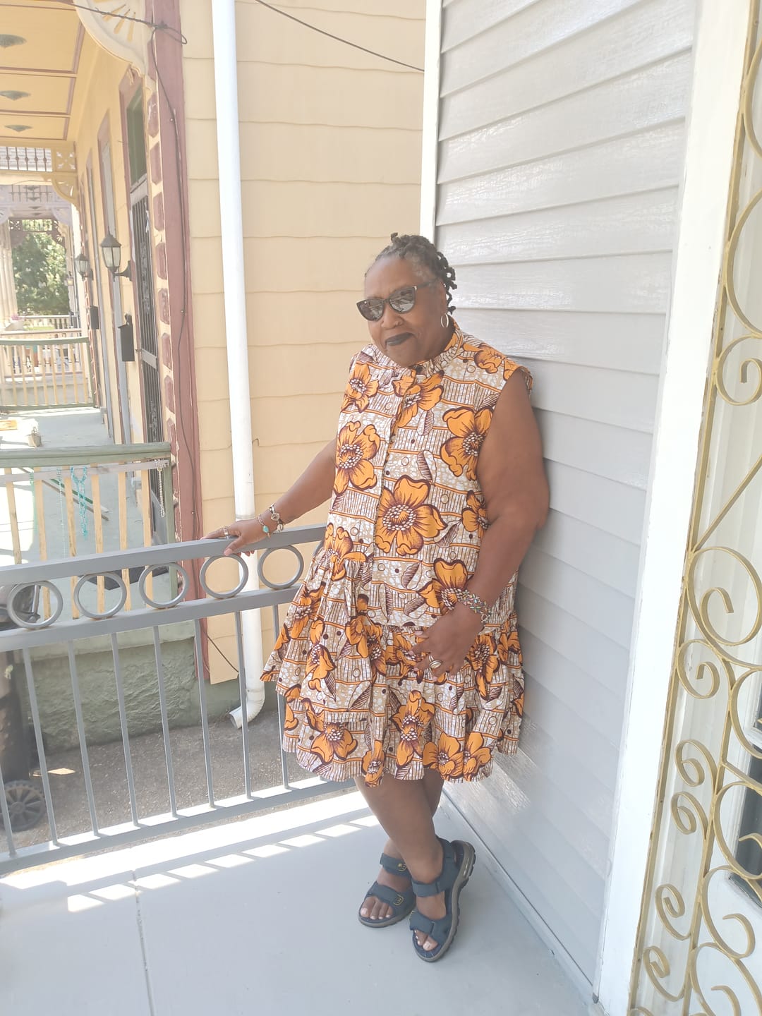 Customer photo review of LAILA AFRICAN PRINT SLEEVELESS TIERED BUTTON DRESS