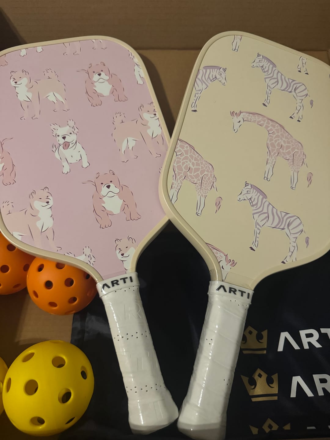 Customer photo review of ARTI Fiberglass "Dogs & Giraffes" Pickleball Paddle Set - USA Pickleball Approved