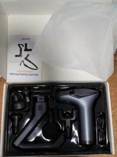 Customer photo review of Pistola Masajeadora Multifunción