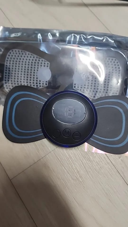 Customer photo review of Masajeador muscular portátil