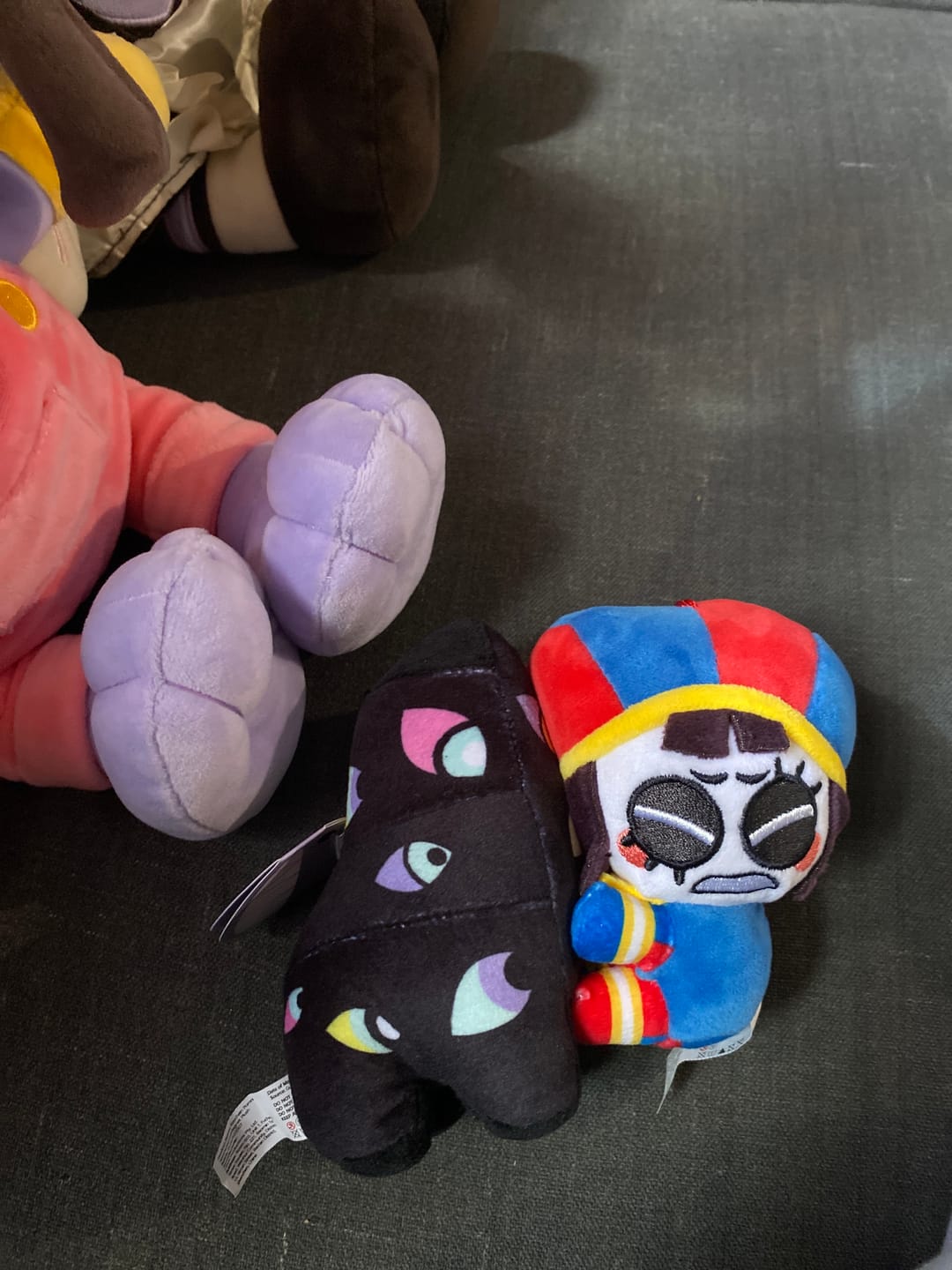 Customer photo review of Pomni & Abstraction Magnetic Plush Keychains