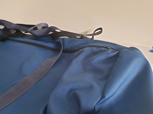Customer's large blue carry bag made from Outdoor Water Resistant Canvas Fabric with webbing straps and zipper