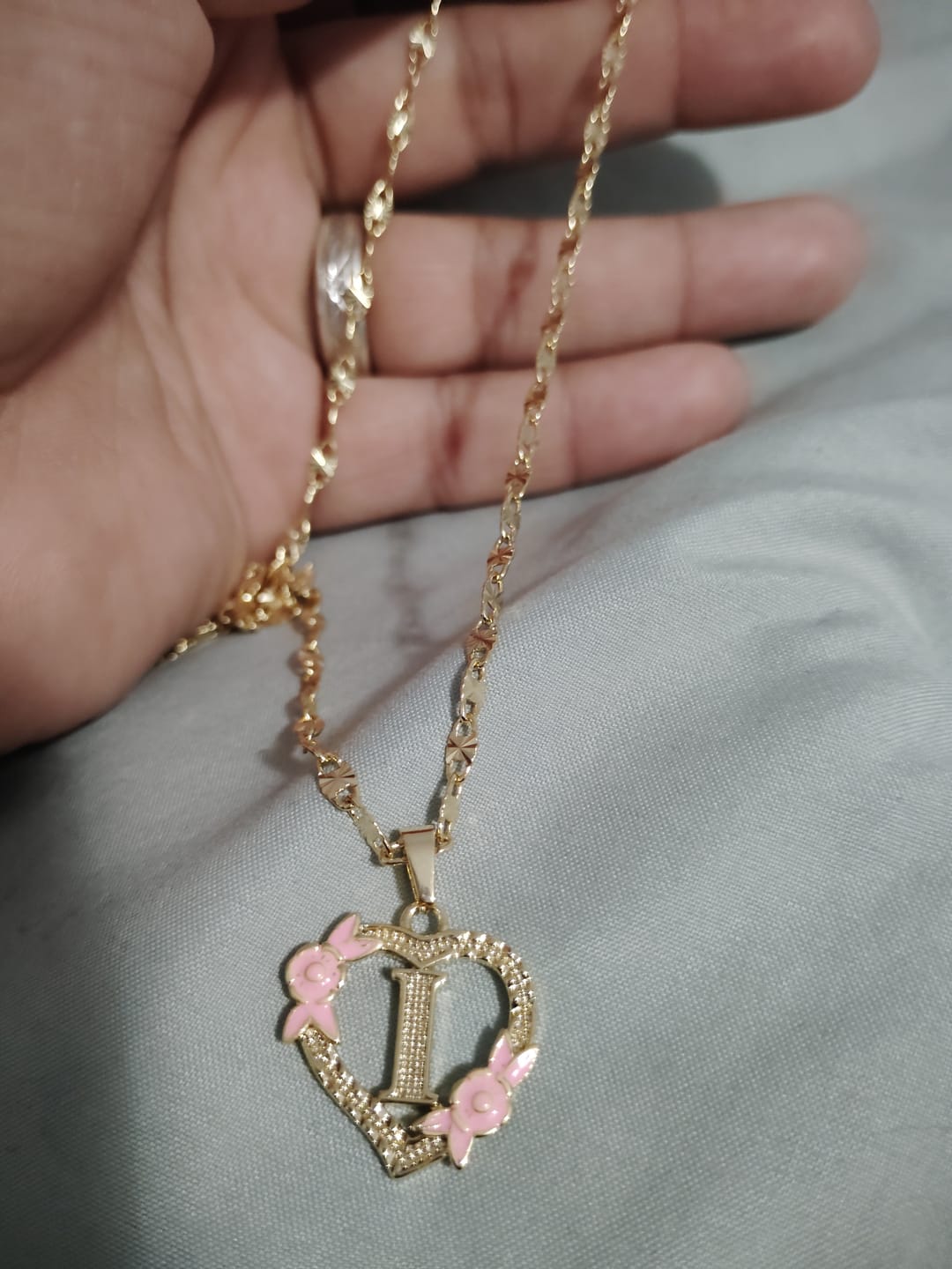 Customer photo review of Flower Initial Necklace w/ Clip Chain