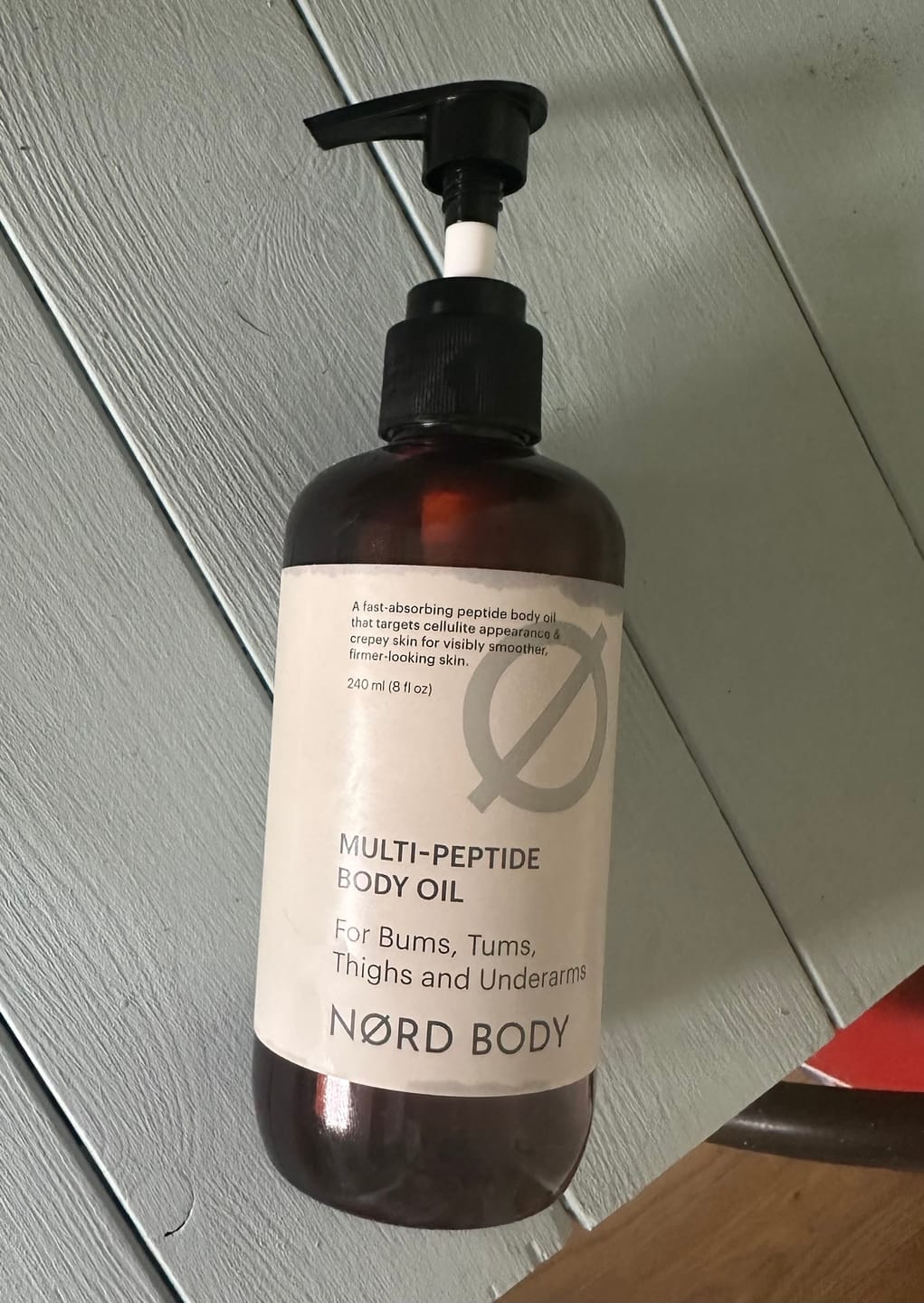 Customer photo review of NØRD BODY Peptide Body Oil