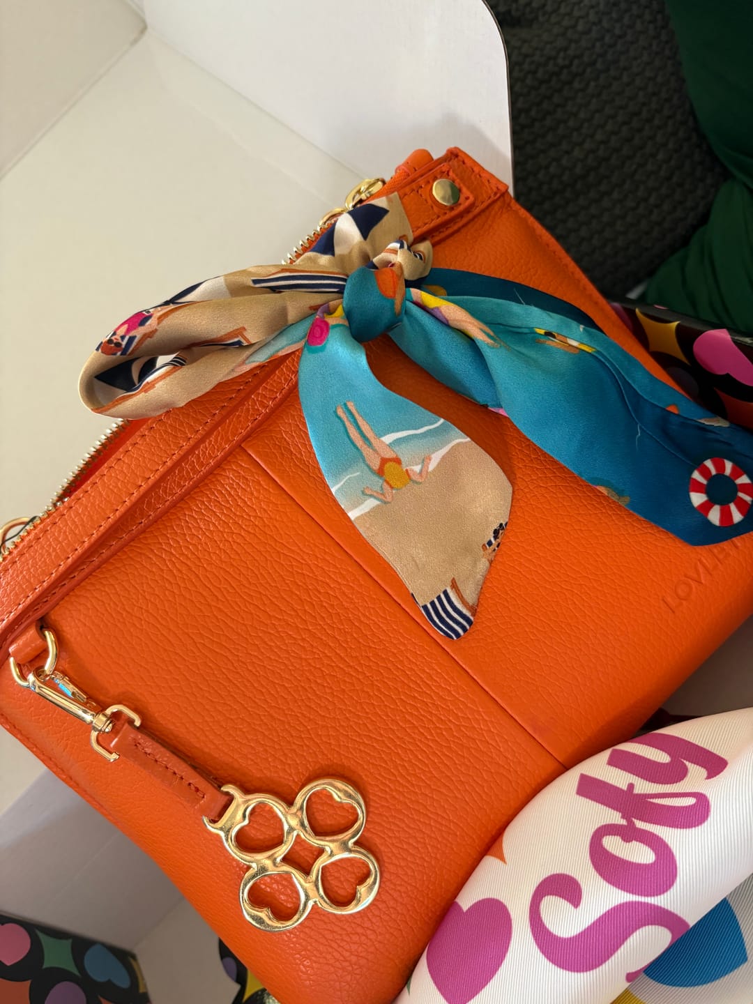 Customer photo review of BORSA MINI SOFY PELLE ARANCIONE