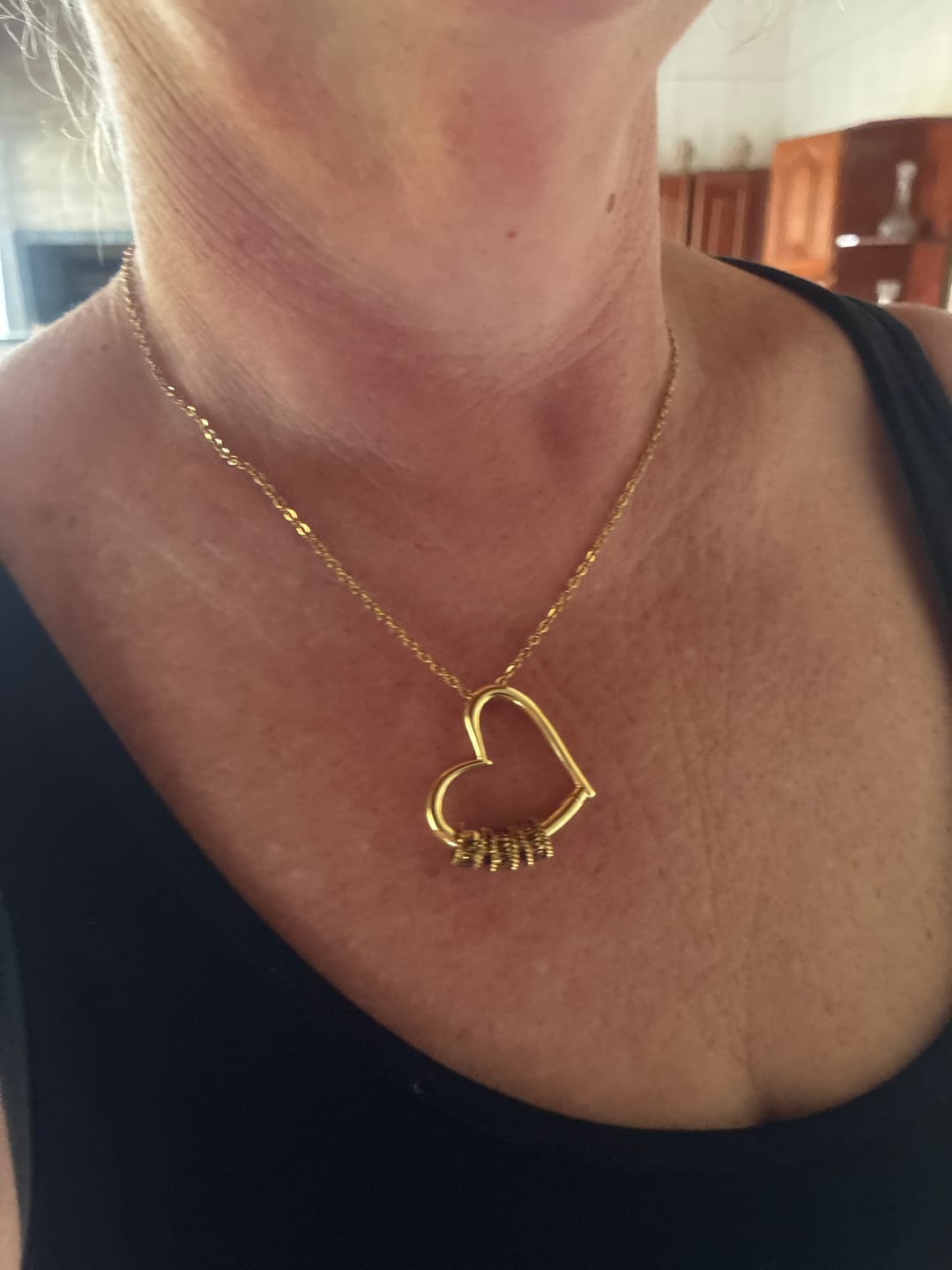 Customer photo review of Colar "Coração da Família"