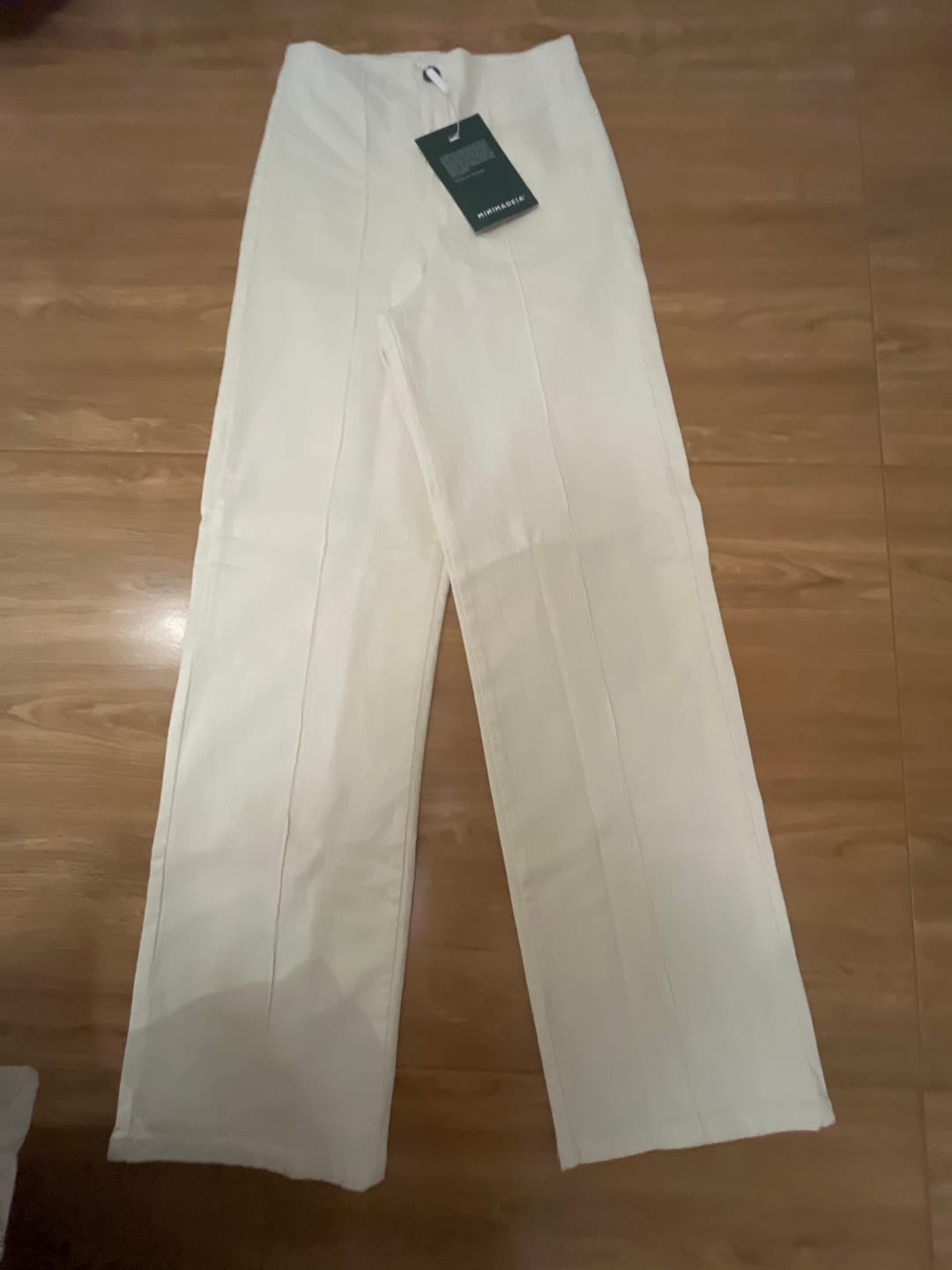 Customer photo review of Calça Jeans Reta Mandacaru Bege Natural