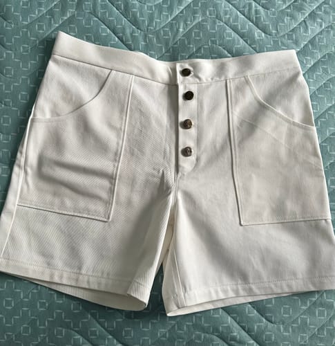 Customer's white Cotton Drill Fabric sewn into a pair of button-front Lander shorts.