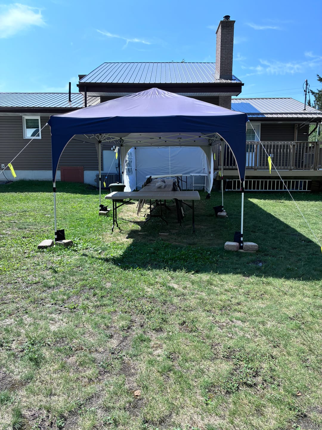 Customer photo review of Aosom 10' x 10' Pop-Up Canopy Tent with Sidewalls - White
