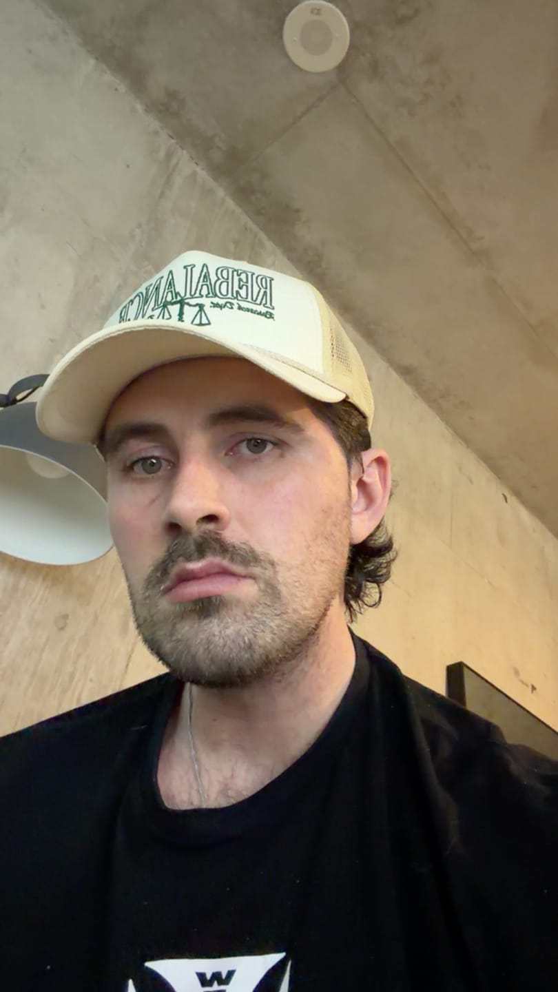 Customer photo review of Recycled Rebalance Trucker Hat