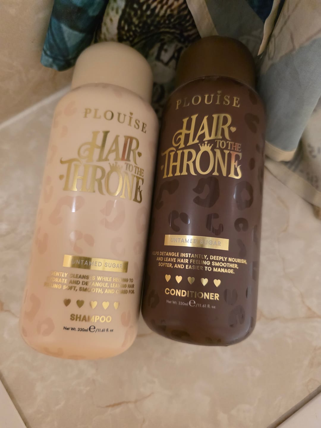 Customer photo review of Cheetah Claim To Tame Hair Care Set
