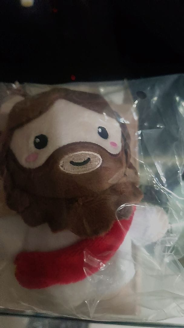 Customer photo review of Mini Jesus Plush Bag Charm