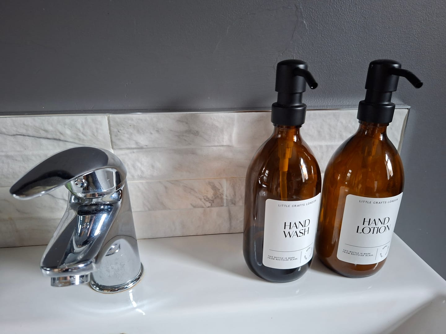 Customer photo review of 500ml Amber Glass Bottle with Metal Pump White Label