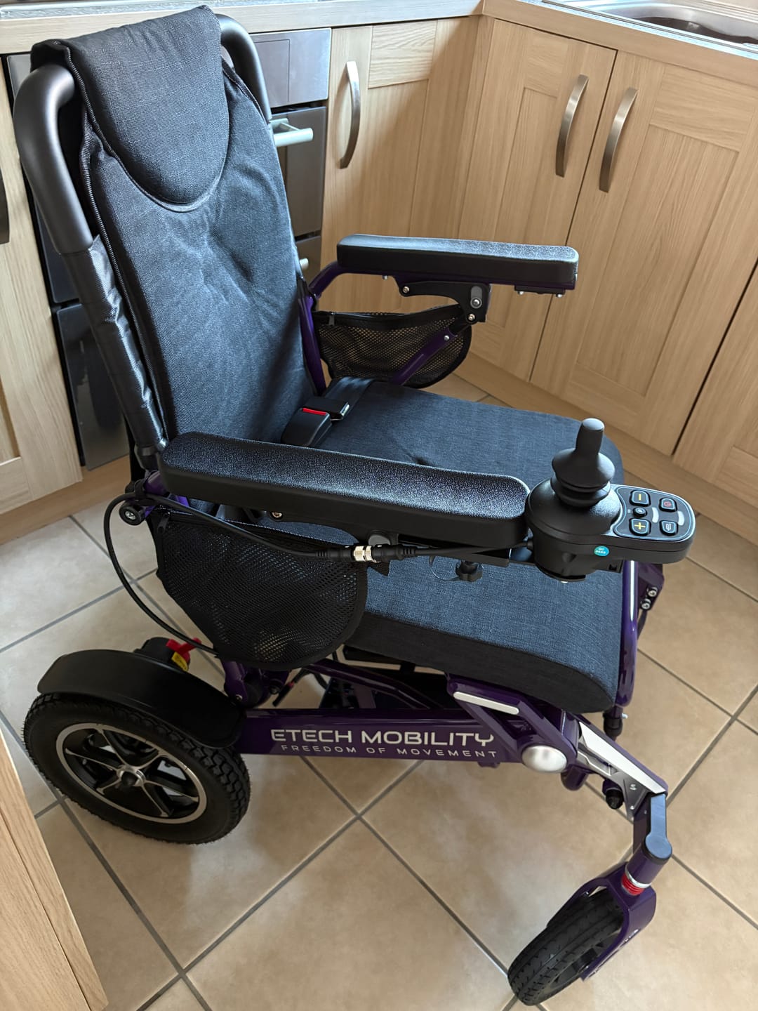 Customer photo review of Freedom Elite ST Lightweight Electric Wheelchair