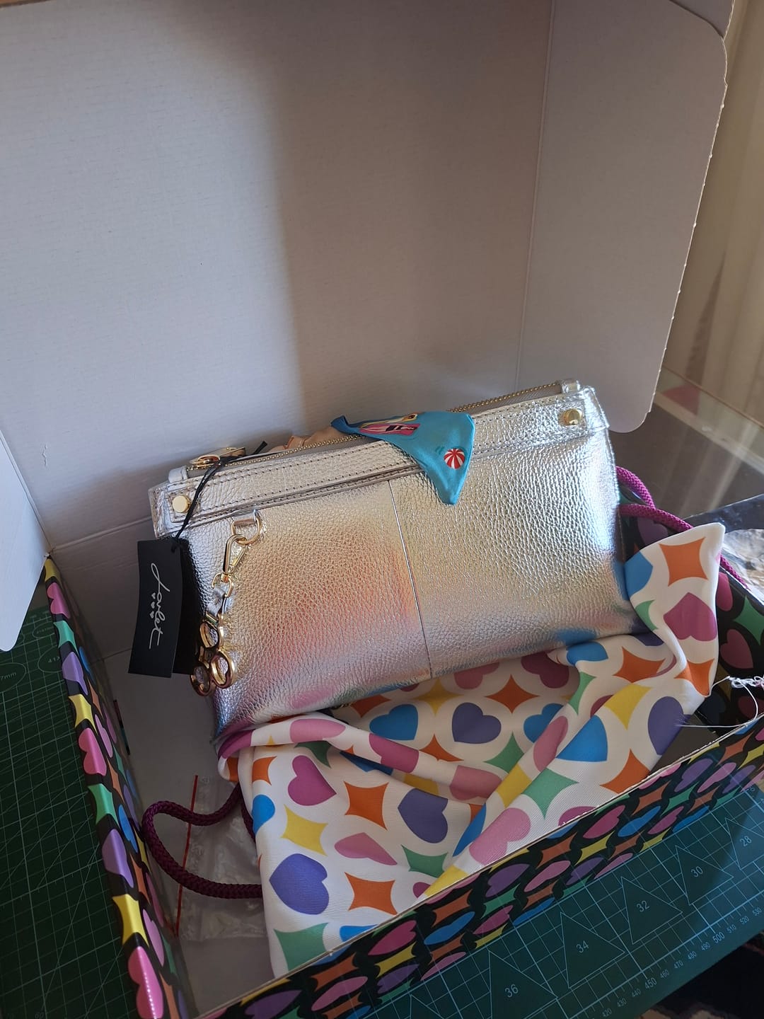 Customer photo review of BORSA SOFY BAGUETTE SHINE ARGENTO