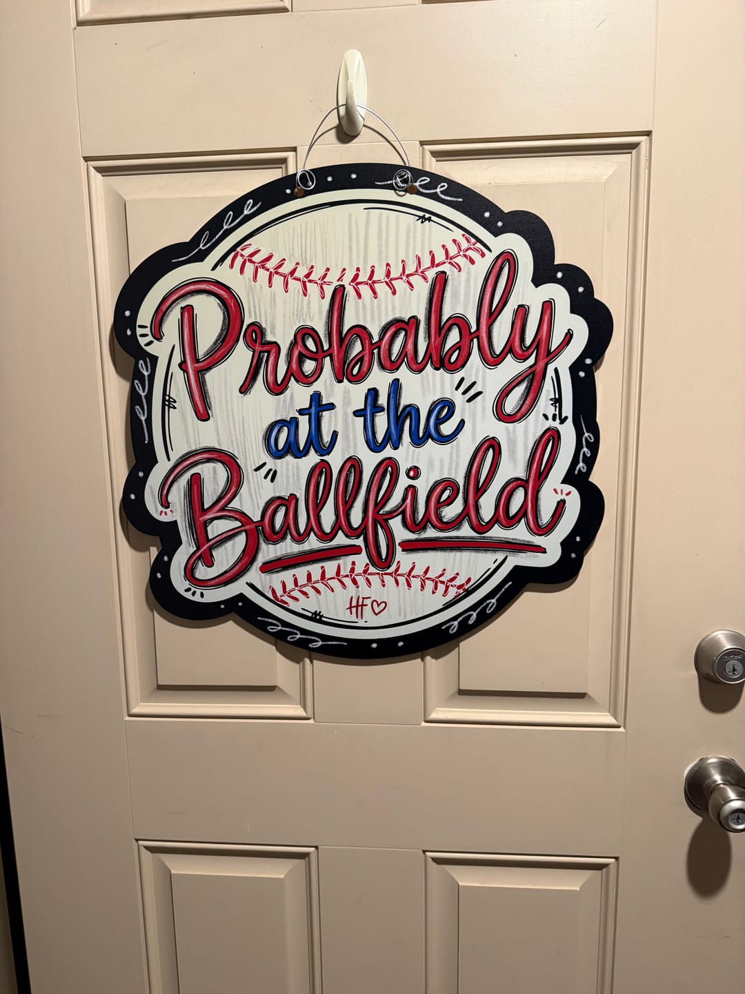 Customer photo review of Probably at the Ballfield Door Hanger