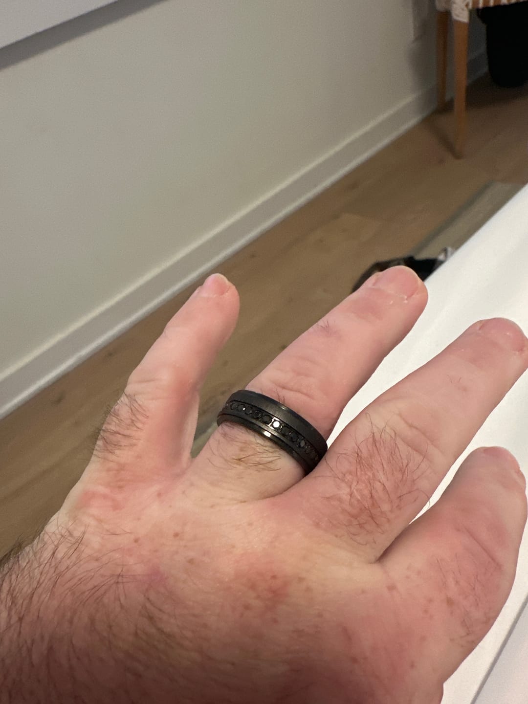 Customer photo review of 8mm Black Titanium Wedding Ring with Round Black Diamonds